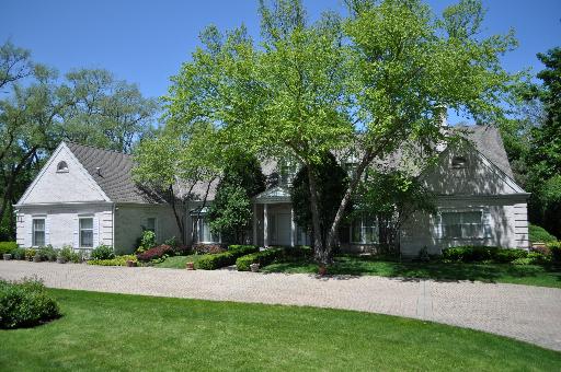 2045 Winnetka Road Northfield, IL 60093 - Photo 1 of 16 front view of a house and a yard
