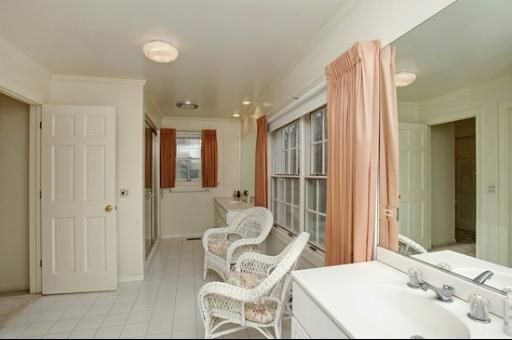 2045 Winnetka Road Northfield, IL 60093 - Photo 12 of 16 a living room with furniture and a large window