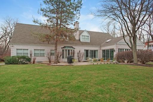 2045 Winnetka Road Northfield, IL 60093 - Photo 16 of 16 a front view of a building with a garden