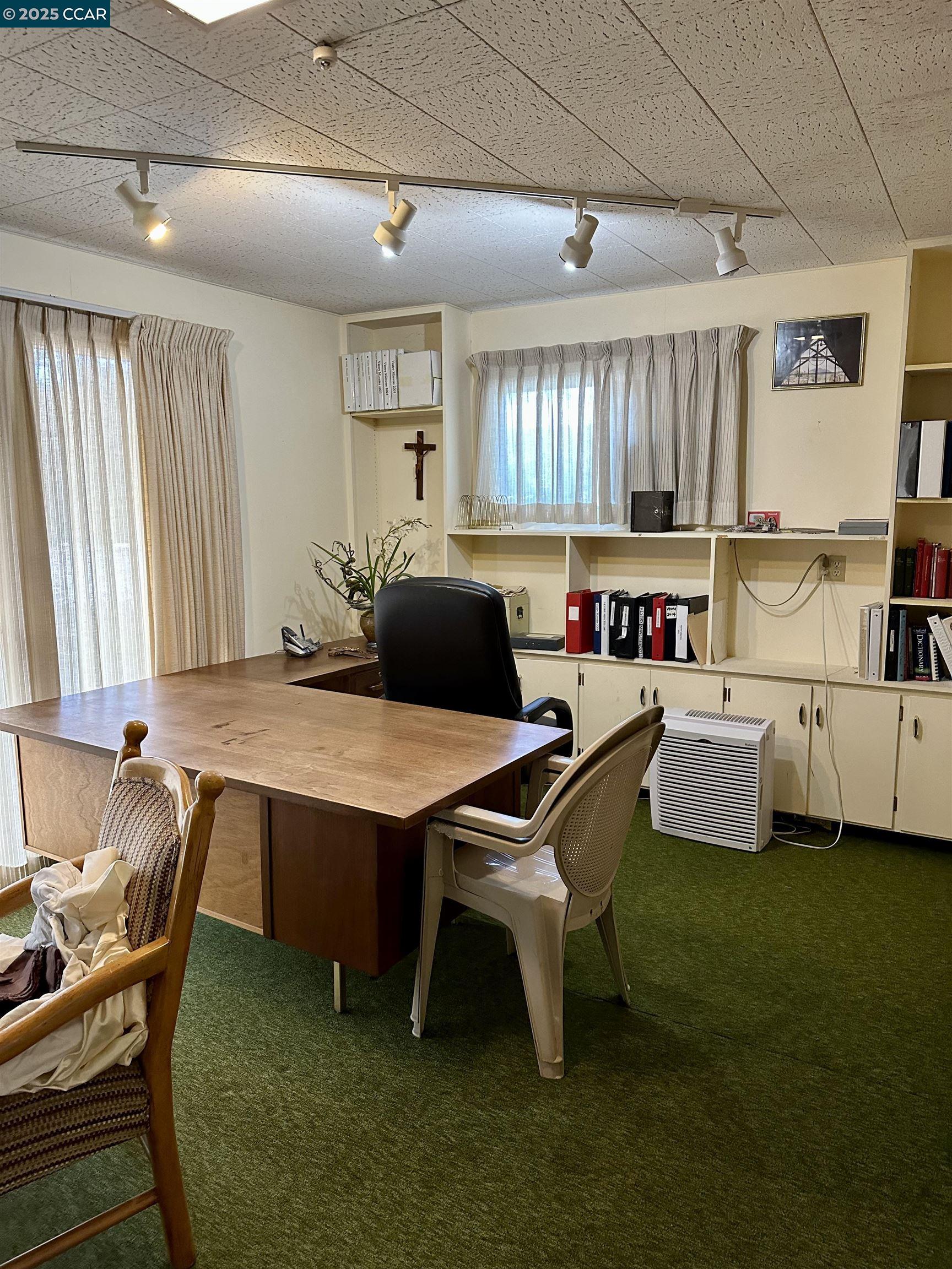2 Tamalpais Drive Corte Madera, CA 94925 - Photo 8 of 8 a kitchen with a table chairs and a window