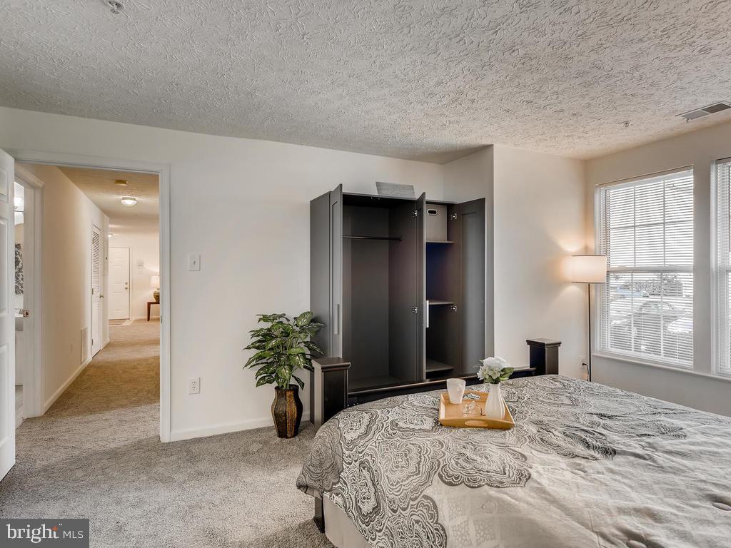 8241 Poplar Mill Road, Unit 8241 Baltimore, MD 21236 - Photo 13 of 26 MSTR BR w/MOBILE CLOSET/MIRROR !(shown open)