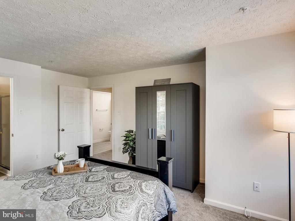 8241 Poplar Mill Road, Unit 8241 Baltimore, MD 21236 - Photo 14 of 26 MASTER BDRM w/ATT MSTR BATH (w/xtra 5-ft closet!)