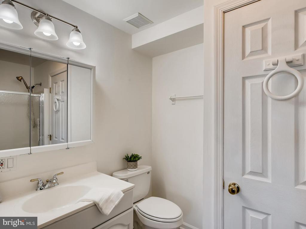 8241 Poplar Mill Road, Unit 8241 Baltimore, MD 21236 - Photo 16 of 26 MSTR BA w/NEW WOOD-STYLE FLOORING & 5-FT CLOSET!