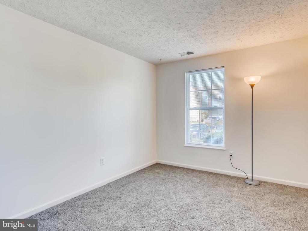 8241 Poplar Mill Road, Unit 8241 Baltimore, MD 21236 - Photo 19 of 26 BEDROOM 2 w/BRAND NEW CARPET!