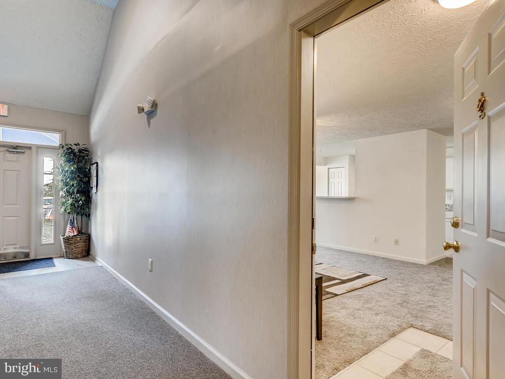 8241 Poplar Mill Road, Unit 8241 Baltimore, MD 21236 - Photo 5 of 26 BUILDING HALL ENTRY w/INTERCOM @ BLDG FT DOOR