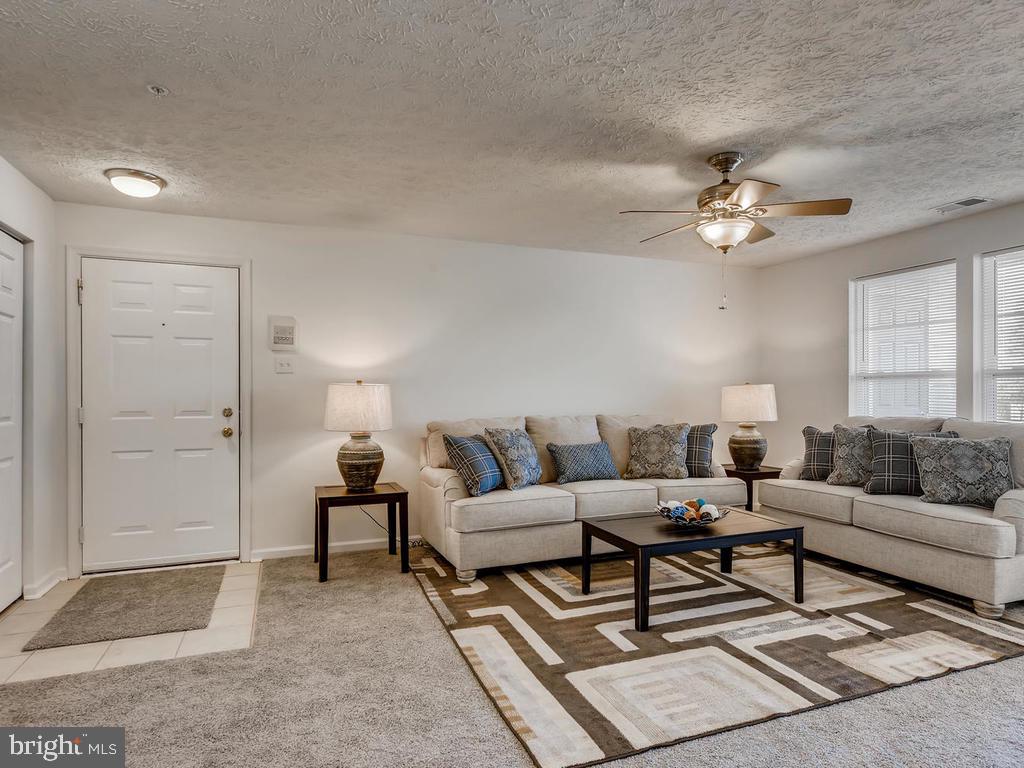 8241 Poplar Mill Road, Unit 8241 Baltimore, MD 21236 - Photo 6 of 26 SPACIOUS LIV RM w/BRAND NEW CARPET , NEW FAN+MORE!