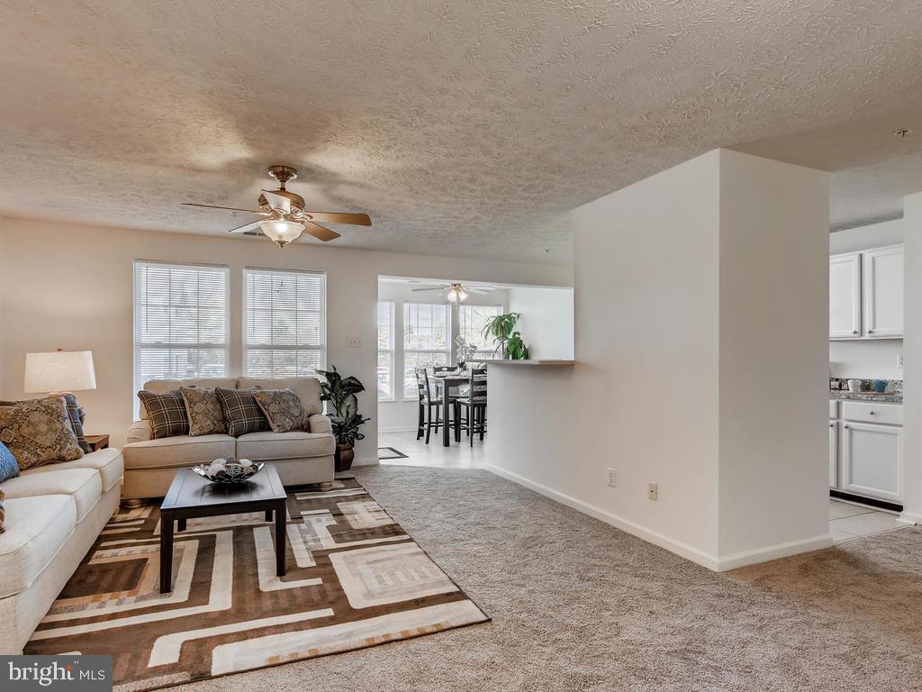 8241 Poplar Mill Road, Unit 8241 Baltimore, MD 21236 - Photo 7 of 26 SPACIOUS LIV RM w/OPEN ACCESS TO KIT & DIN RM!