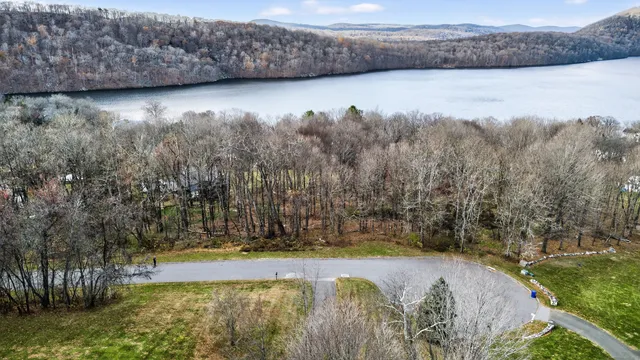 a view of a city with mountains in the background