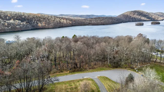 a view of a lake with mountain