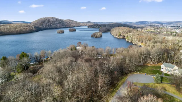 a view of a city with mountains in the background