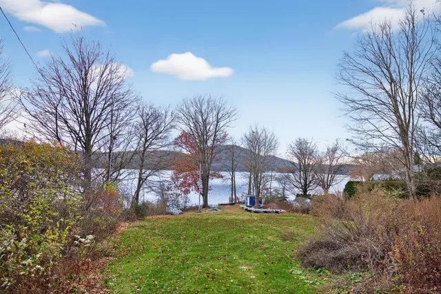 a view of a patio with a yard