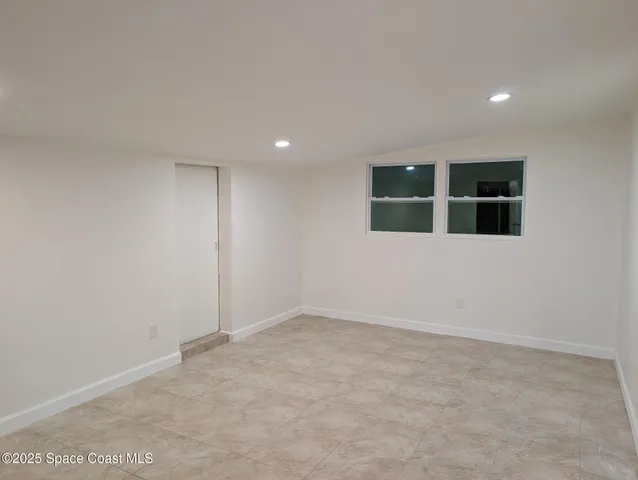 an empty room with closet