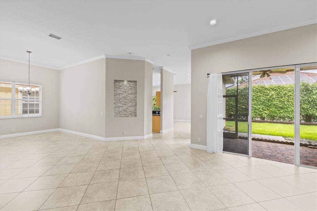 1441 Cardinal Way Weston, FL 33327 - Photo 13 of 96 a view of an empty room with a window