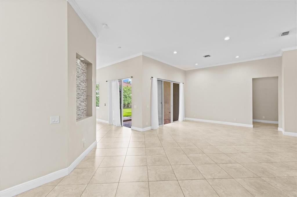 1441 Cardinal Way Weston, FL 33327 - Photo 15 of 96 a view of an empty room with a window