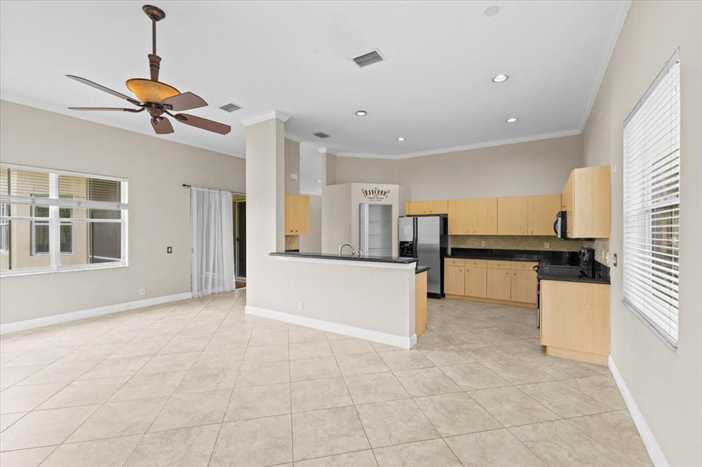 1441 Cardinal Way Weston, FL 33327 - Photo 17 of 96 a view of a kitchen with a sink and a window