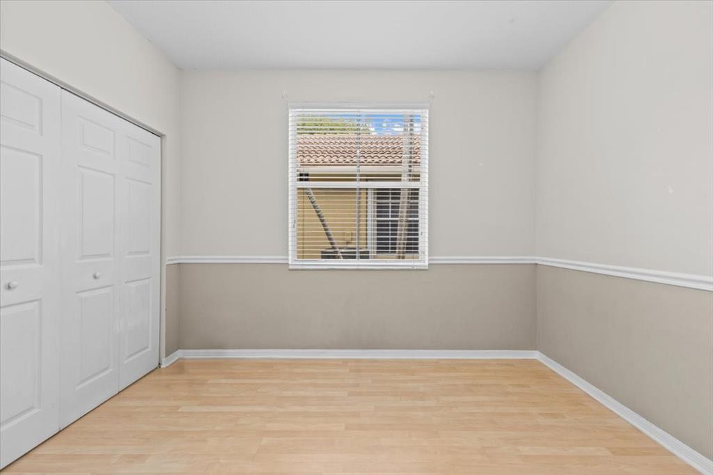 1441 Cardinal Way Weston, FL 33327 - Photo 29 of 96 a view of an empty room with a window