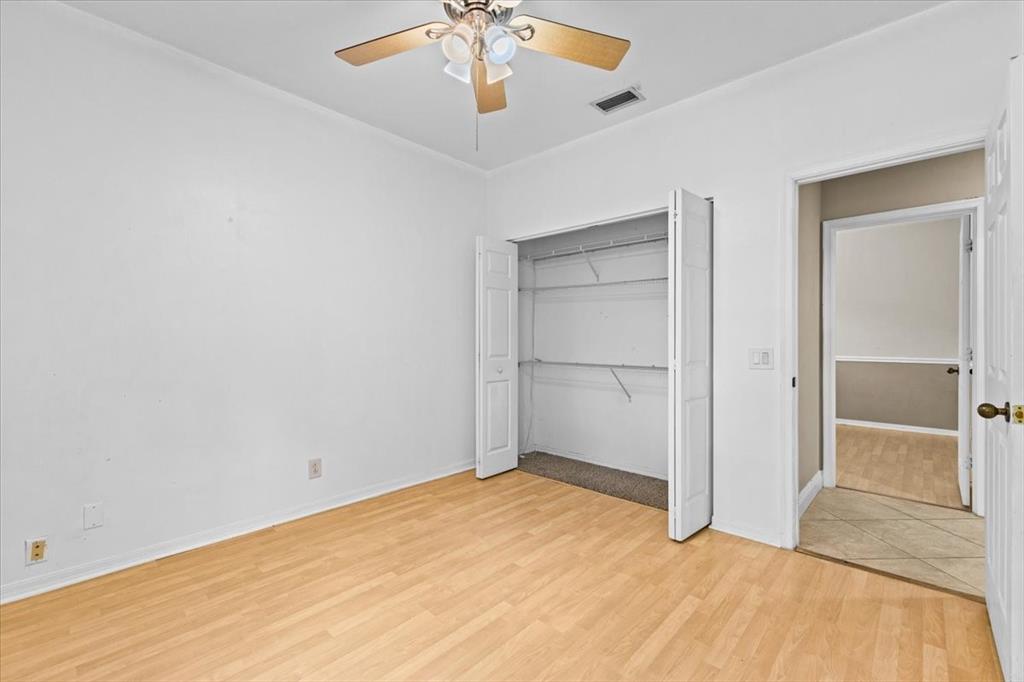 1441 Cardinal Way Weston, FL 33327 - Photo 33 of 96 a view of an empty room with a chandelier fan