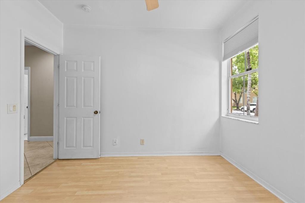 1441 Cardinal Way Weston, FL 33327 - Photo 34 of 96 an empty room with windows