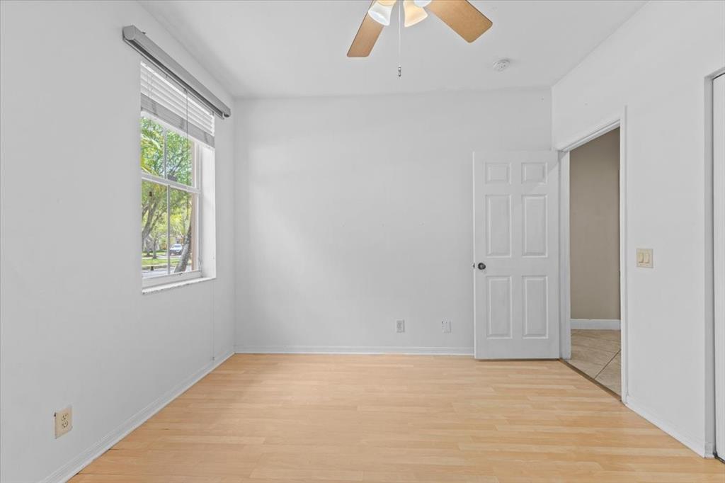 1441 Cardinal Way Weston, FL 33327 - Photo 36 of 96 an empty room with windows