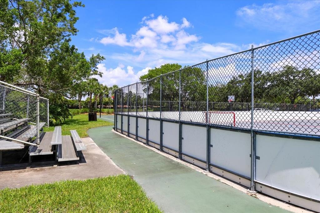 1441 Cardinal Way Weston, FL 33327 - Photo 78 of 96 a view of a park with iron fence