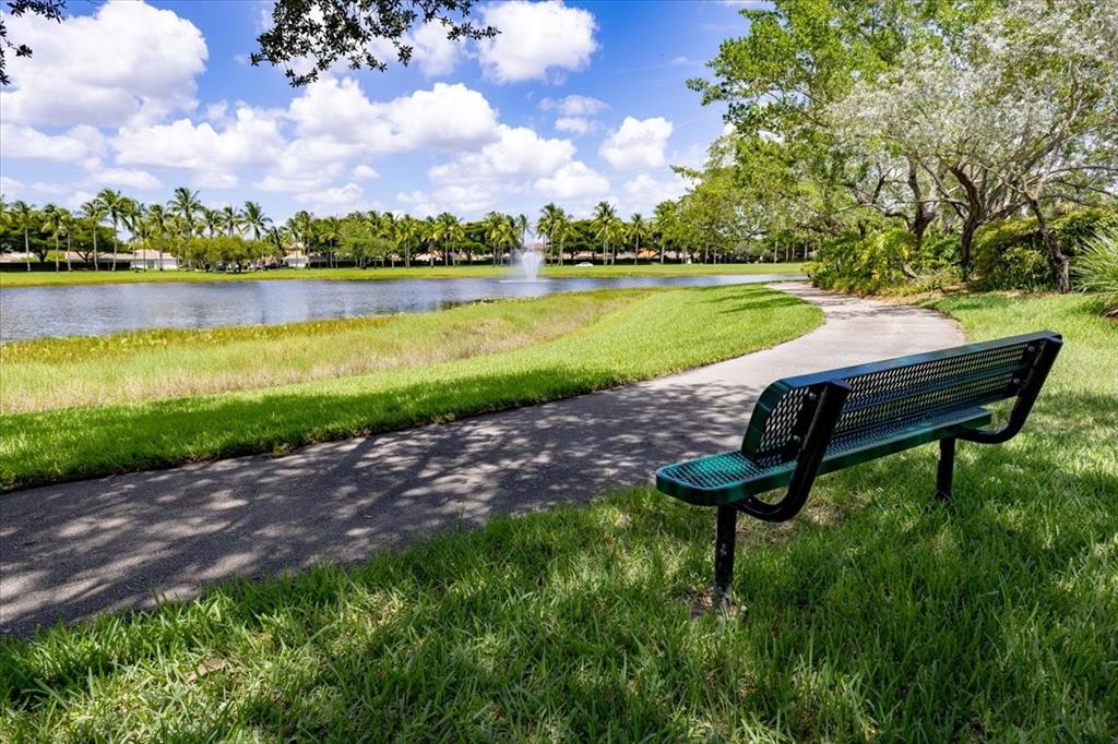 1441 Cardinal Way Weston, FL 33327 - Photo 79 of 96 a view of a lake with a yard and lake view
