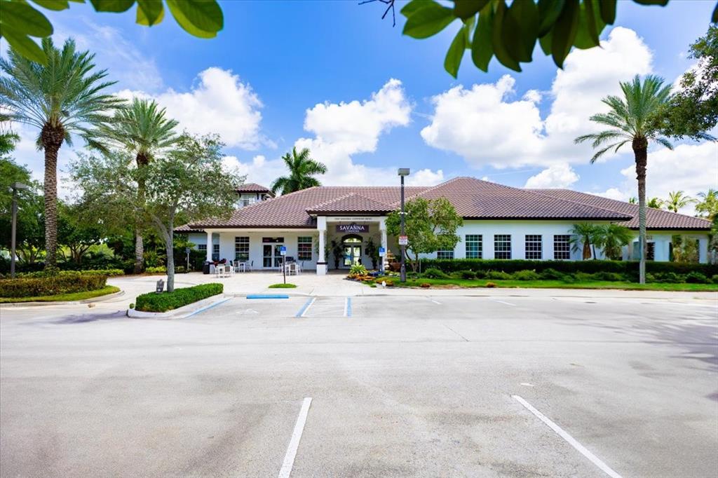 1441 Cardinal Way Weston, FL 33327 - Photo 81 of 96 a view of a swimming pool with lawn chairs and plants