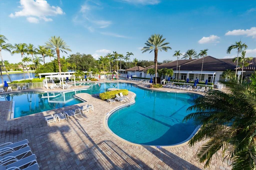 1441 Cardinal Way Weston, FL 33327 - Photo 85 of 96 a view of a swimming pool with chairs