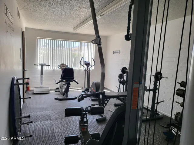 a view of a room with gym equipment