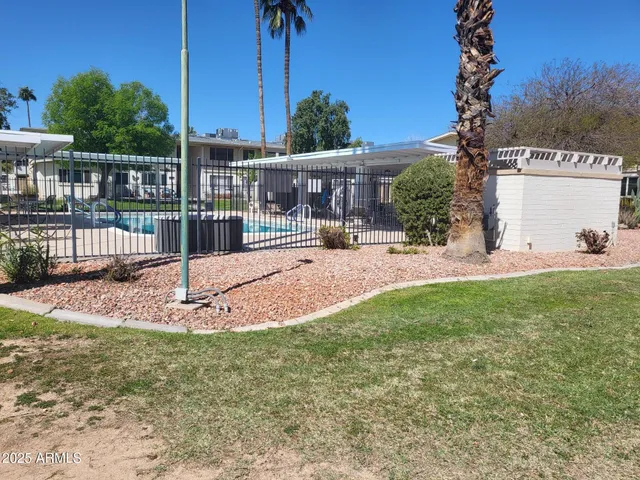 a view of a backyard with a slide