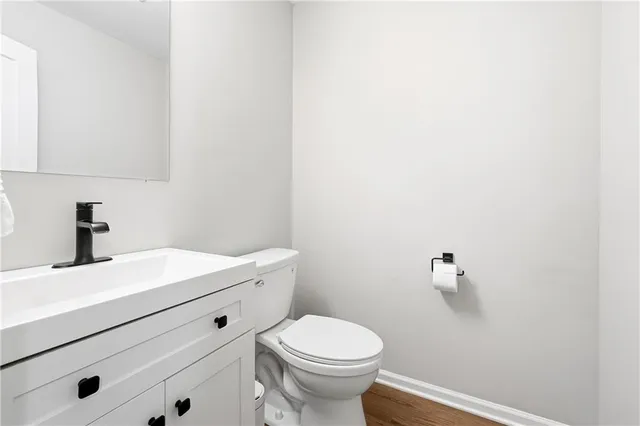 a bathroom with a sink and a toilet