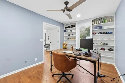 a workspace with furniture and window