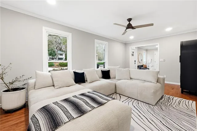 a living room with furniture and a window