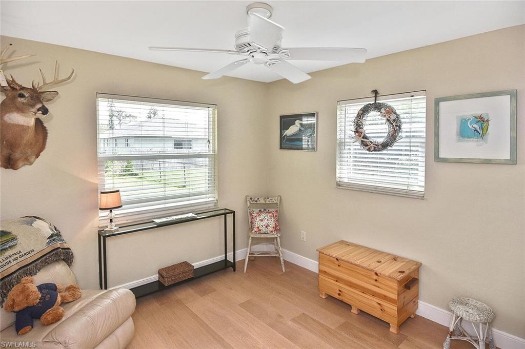 19031 Evergreen Road Fort Myers, FL 33967 - Photo 32 of 44 a living room with furniture and a window