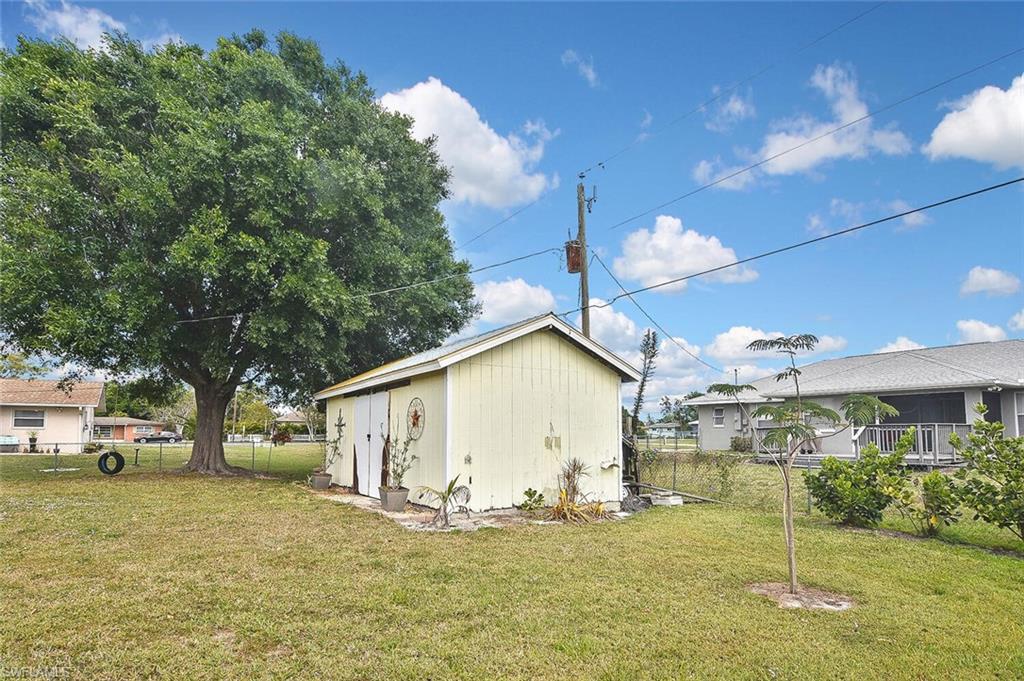 19031 Evergreen Road Fort Myers, FL 33967 - Photo 41 of 44 a view of a house with a yard