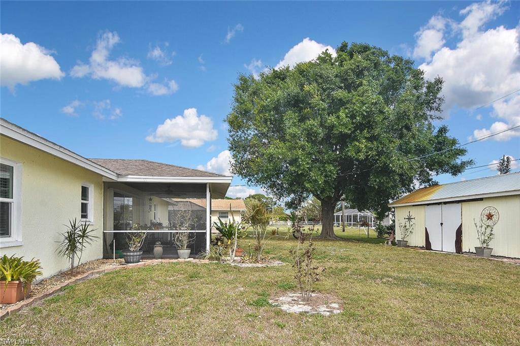 19031 Evergreen Road Fort Myers, FL 33967 - Photo 42 of 44 a view of a house with a yard