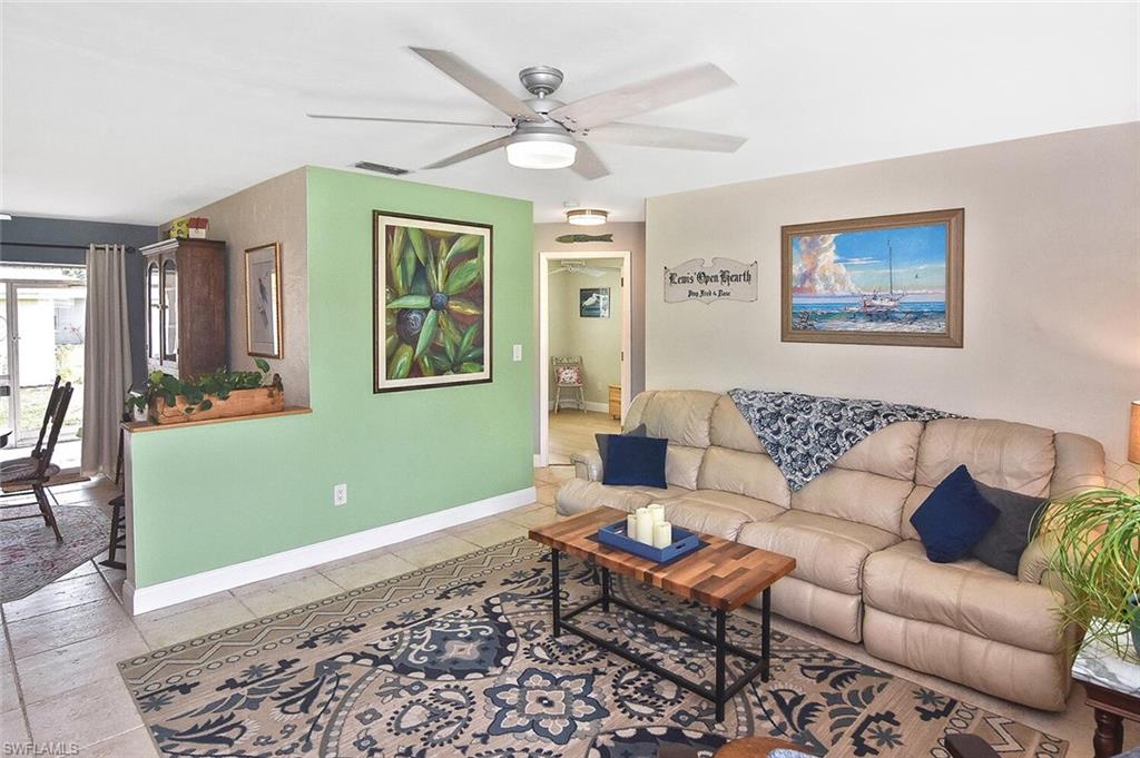 19031 Evergreen Road Fort Myers, FL 33967 - Photo 7 of 44 a living room with furniture and a window