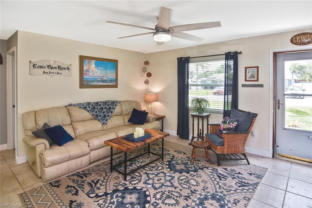 19031 Evergreen Road Fort Myers, FL 33967 - Photo 8 of 44 a living room with furniture and wooden floor