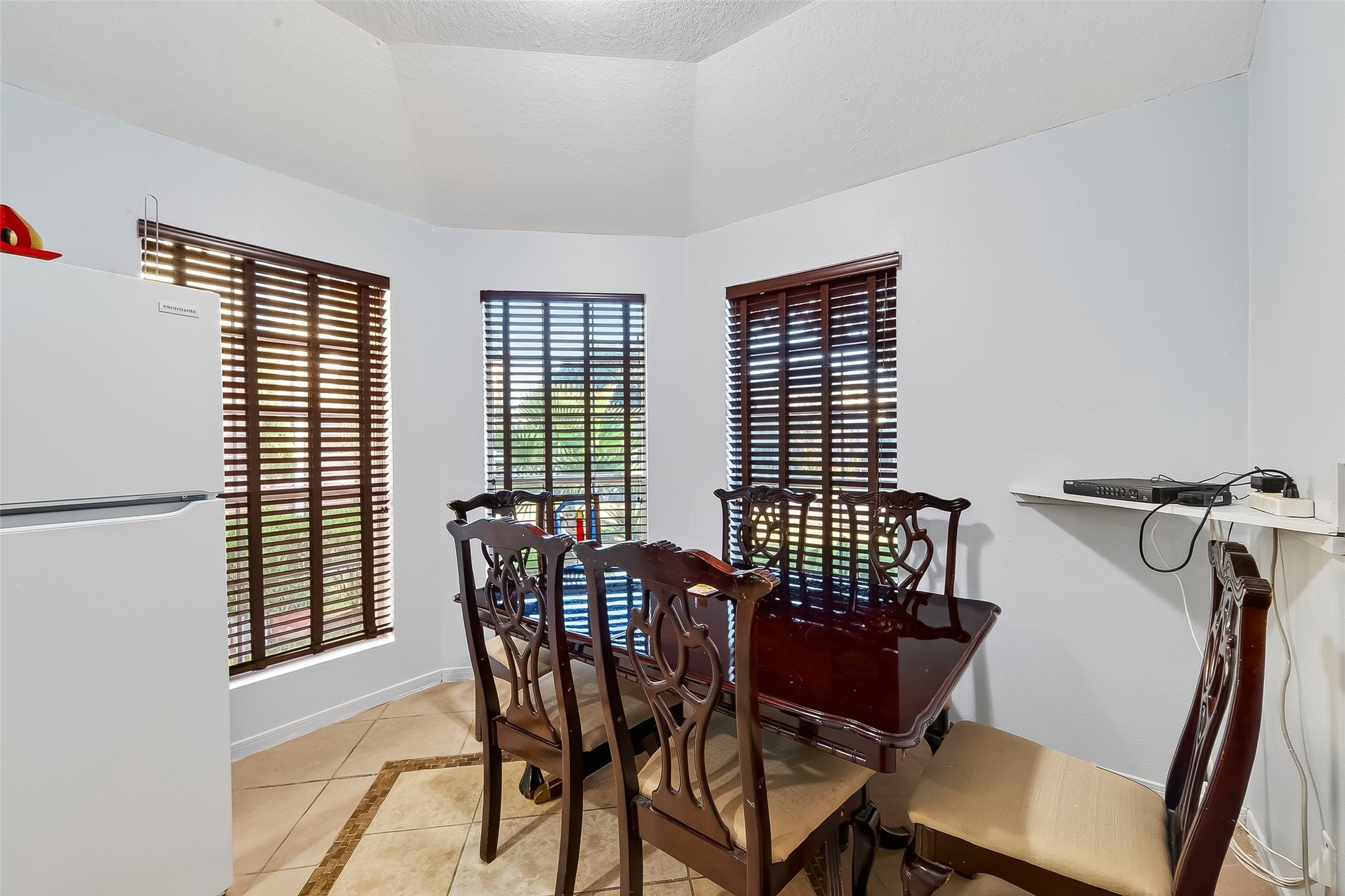 19322 Dawn Canyon Road Houston, TX 77084 - Photo 14 of 33 a view of a dining room with furniture and windows