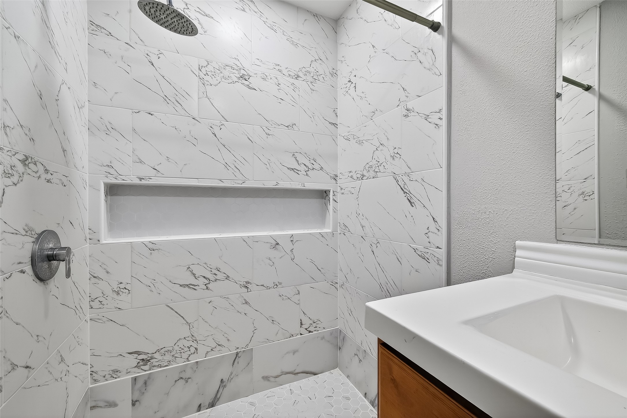 19322 Dawn Canyon Road Houston, TX 77084 - Photo 19 of 33 a bathroom with a sink and vanity