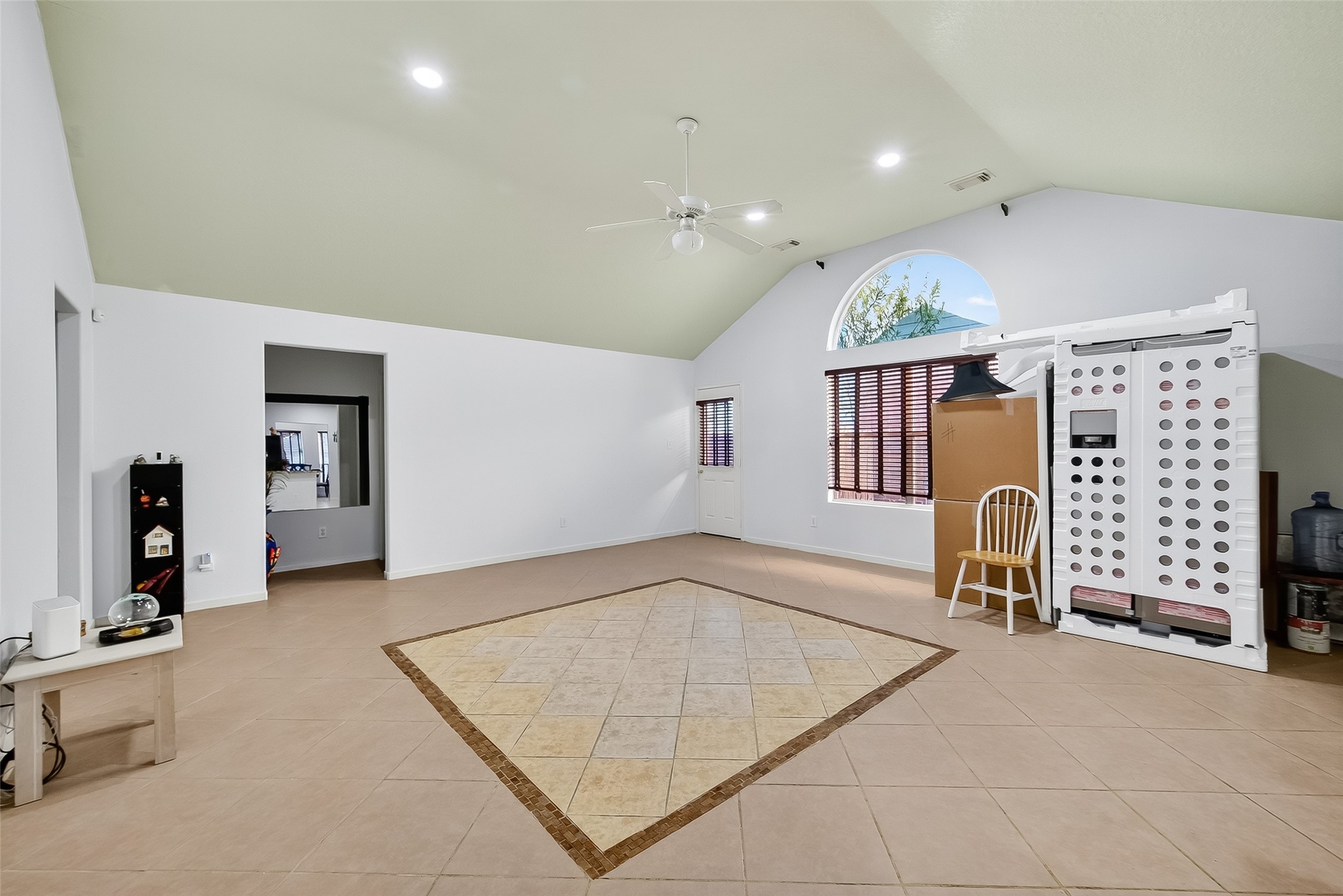 19322 Dawn Canyon Road Houston, TX 77084 - Photo 6 of 33 a view of a livingroom with furniture and a ceiling fan