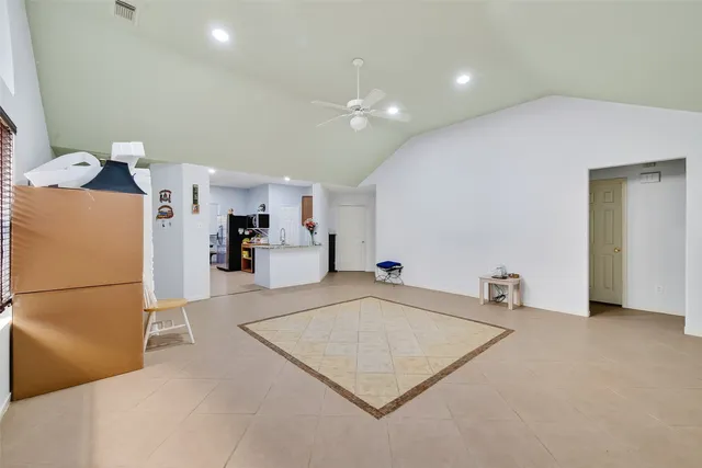 a living room with furniture and a table