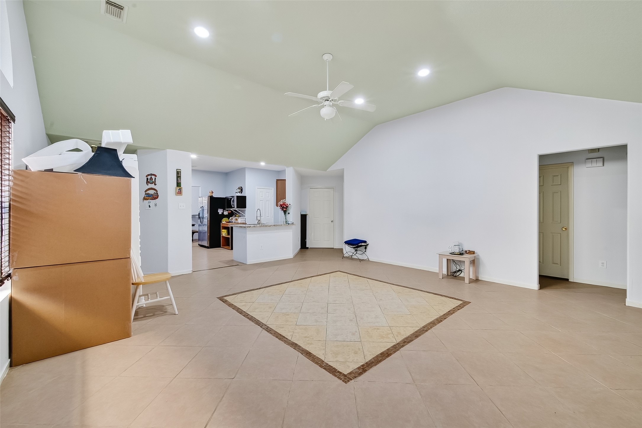 19322 Dawn Canyon Road Houston, TX 77084 - Photo 8 of 33 a living room with furniture and a table