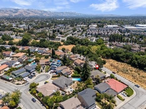 an aerial view of a city with lots of residential buildings