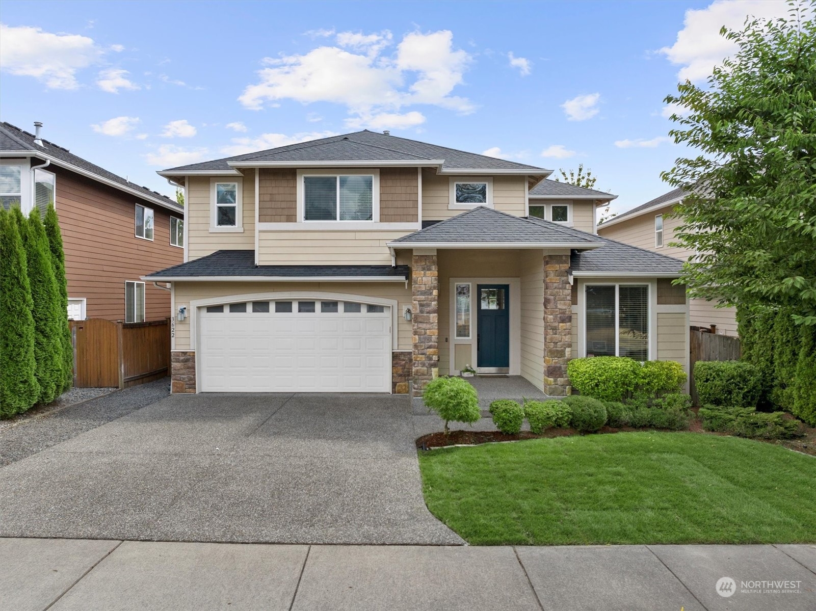 3622 222nd Place Southeast Bothell, WA 98021 - Photo 1 of 40 a view of a house with a yard and potted plants