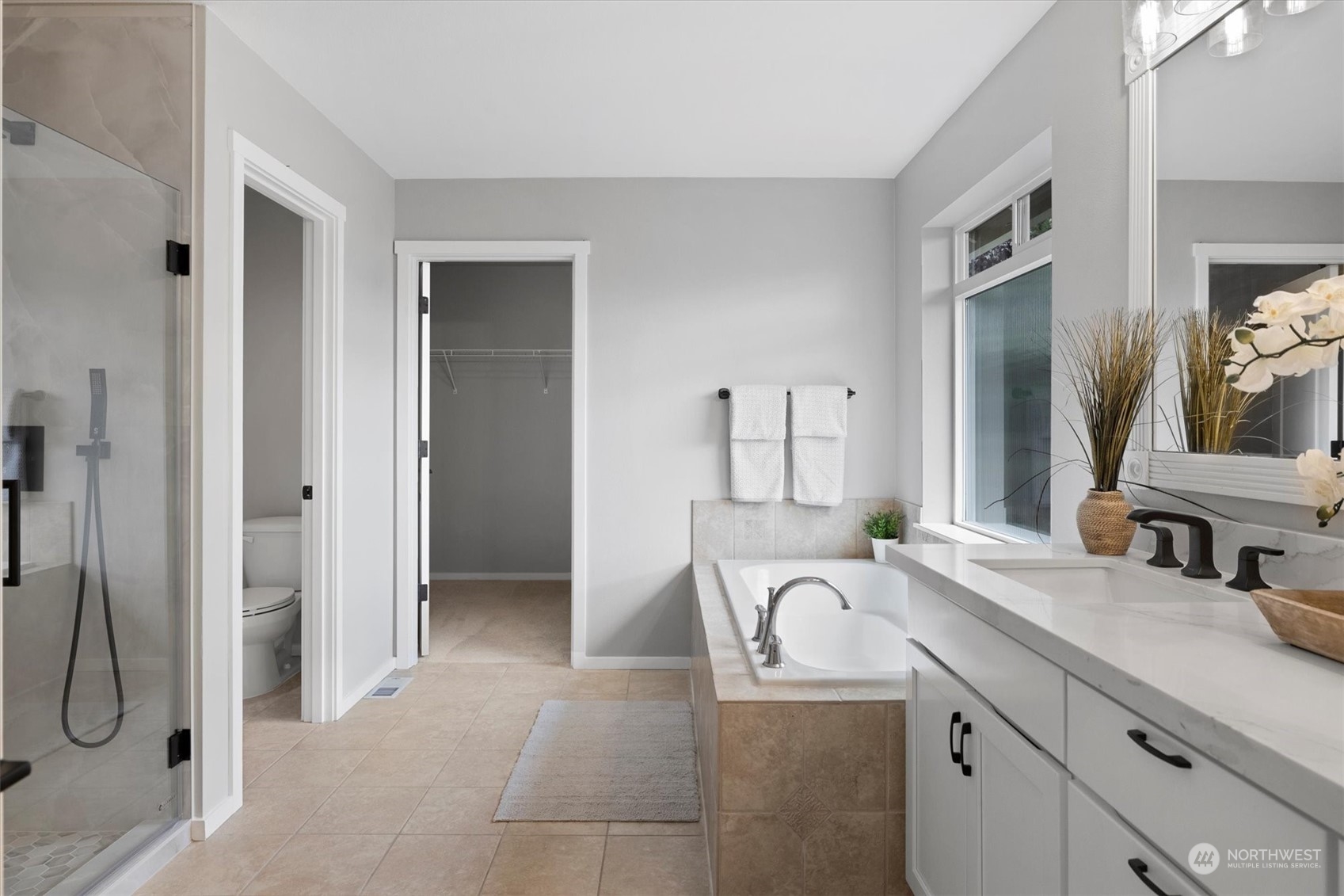 3622 222nd Place Southeast Bothell, WA 98021 - Photo 27 of 40 a bathroom with a sink and a mirror