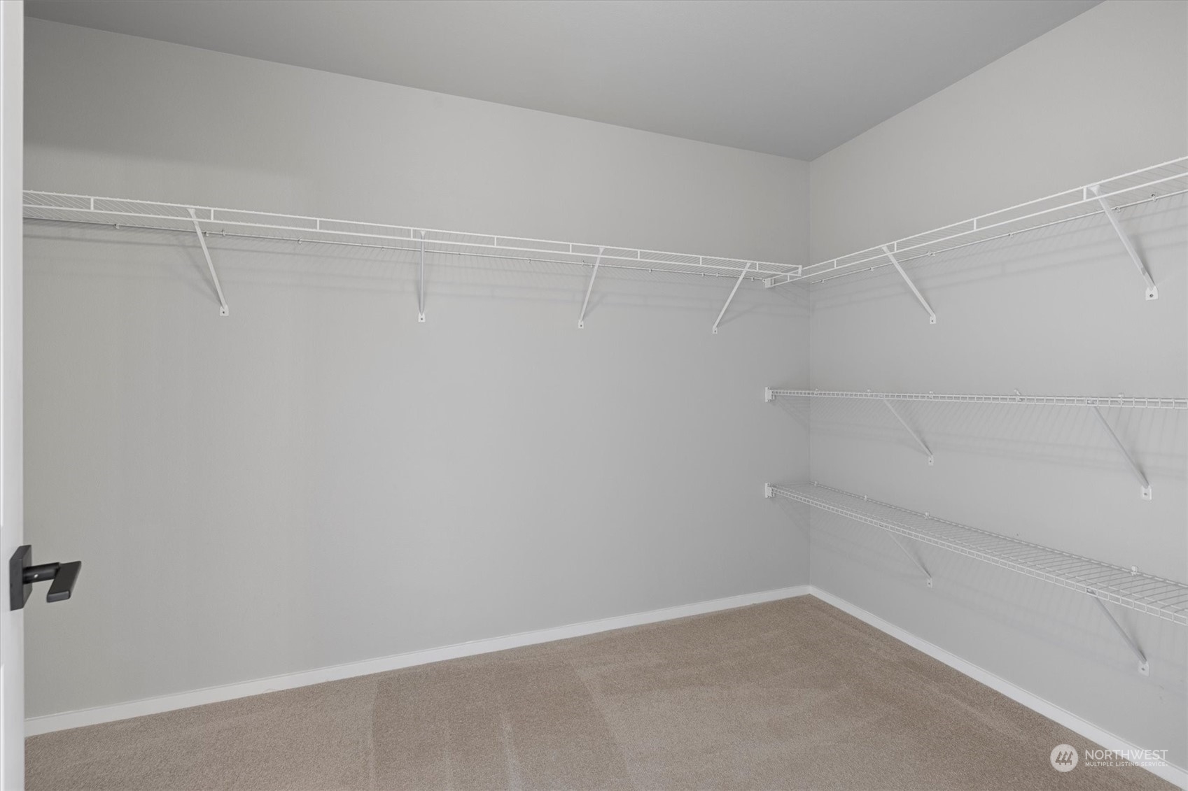 3622 222nd Place Southeast Bothell, WA 98021 - Photo 30 of 40 a view of a room with shelf on the wall