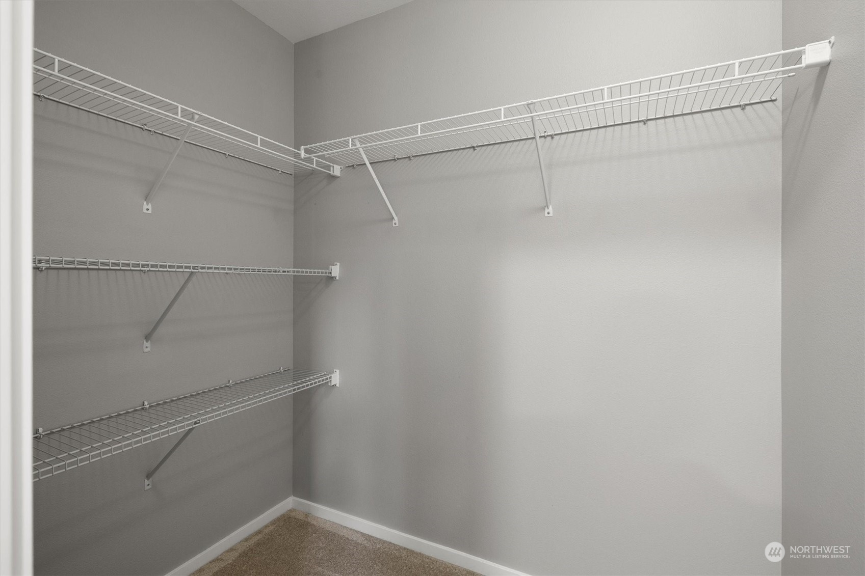3622 222nd Place Southeast Bothell, WA 98021 - Photo 32 of 40 a view of a room with racks on the wall