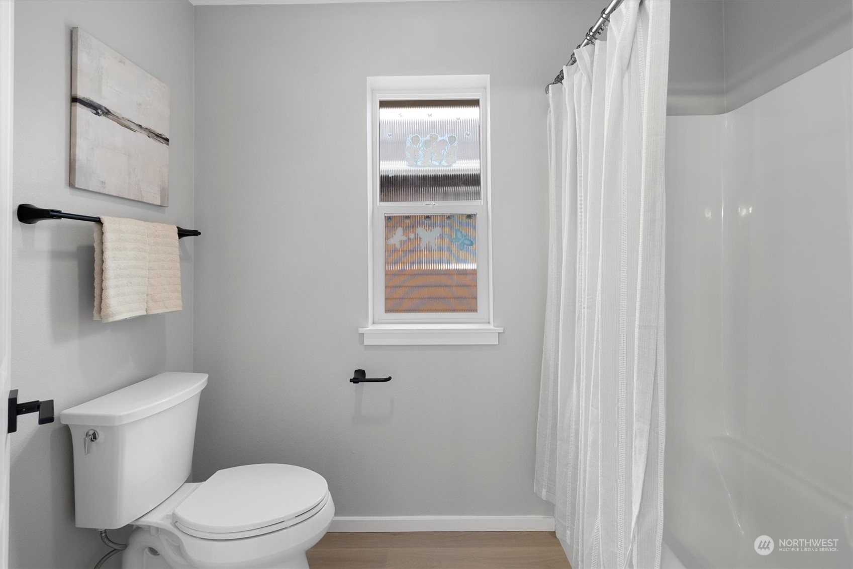 3622 222nd Place Southeast Bothell, WA 98021 - Photo 36 of 40 a white toilet sitting next to a bathroom sink