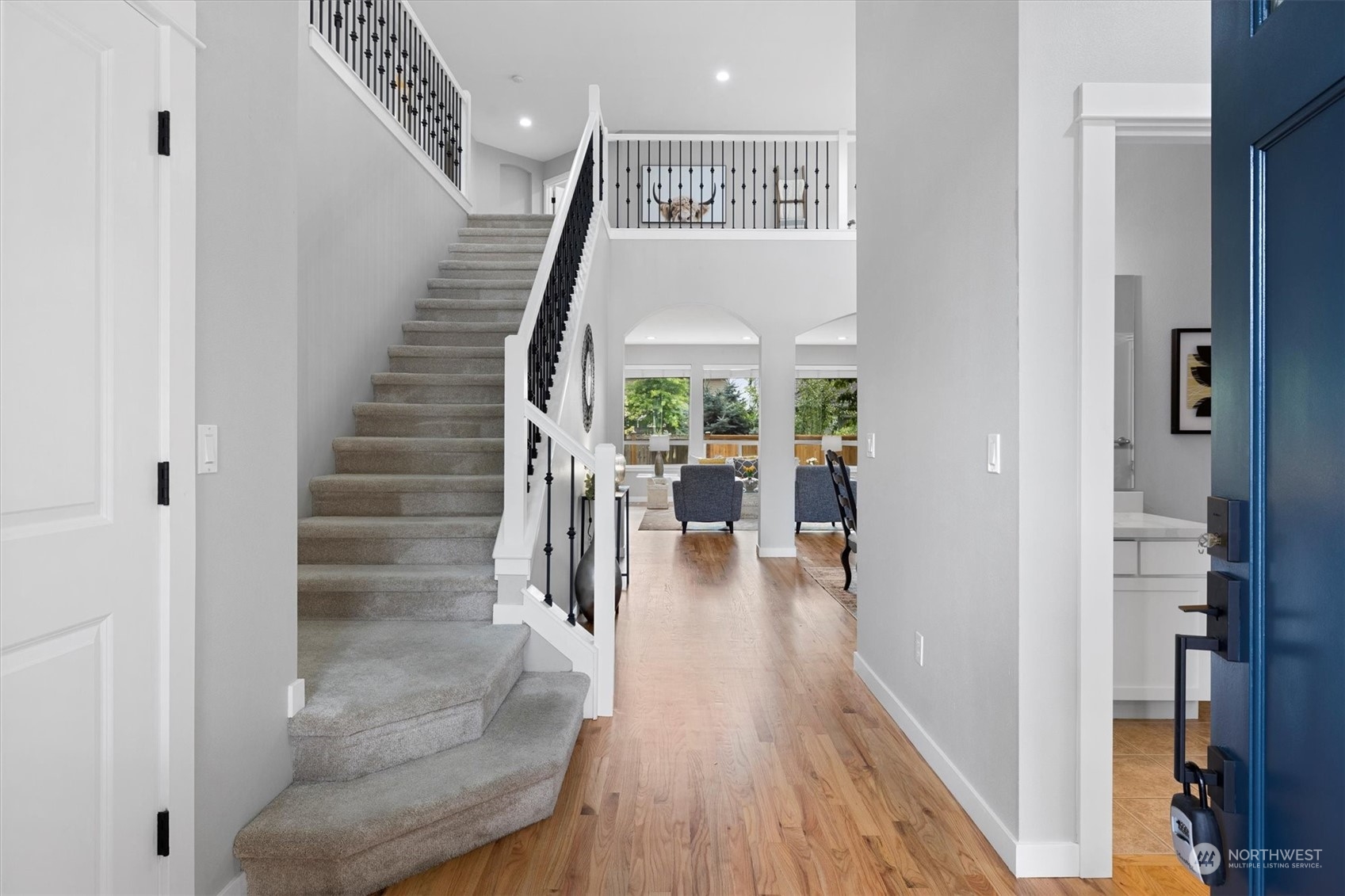 3622 222nd Place Southeast Bothell, WA 98021 - Photo 4 of 40 a view of entryway and hall with wooden floor