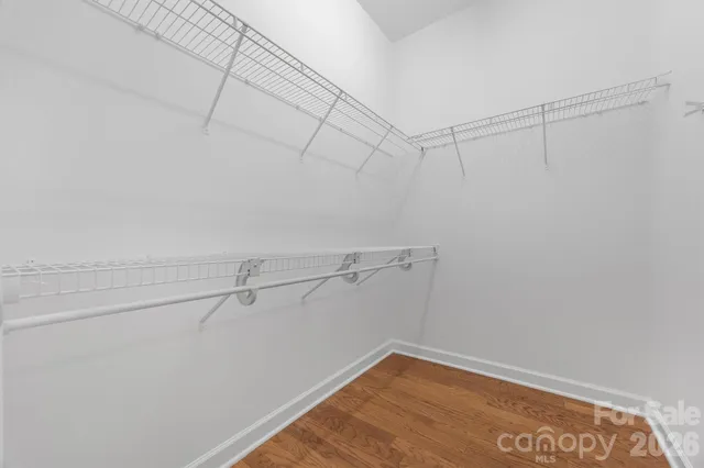 a view of a room with racks on the wall